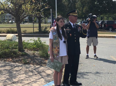  Leasure Alumna Lizzy Phillips stands with Major General Michael R. Berry